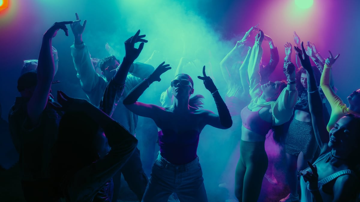 Vibrant party scene with people dancing